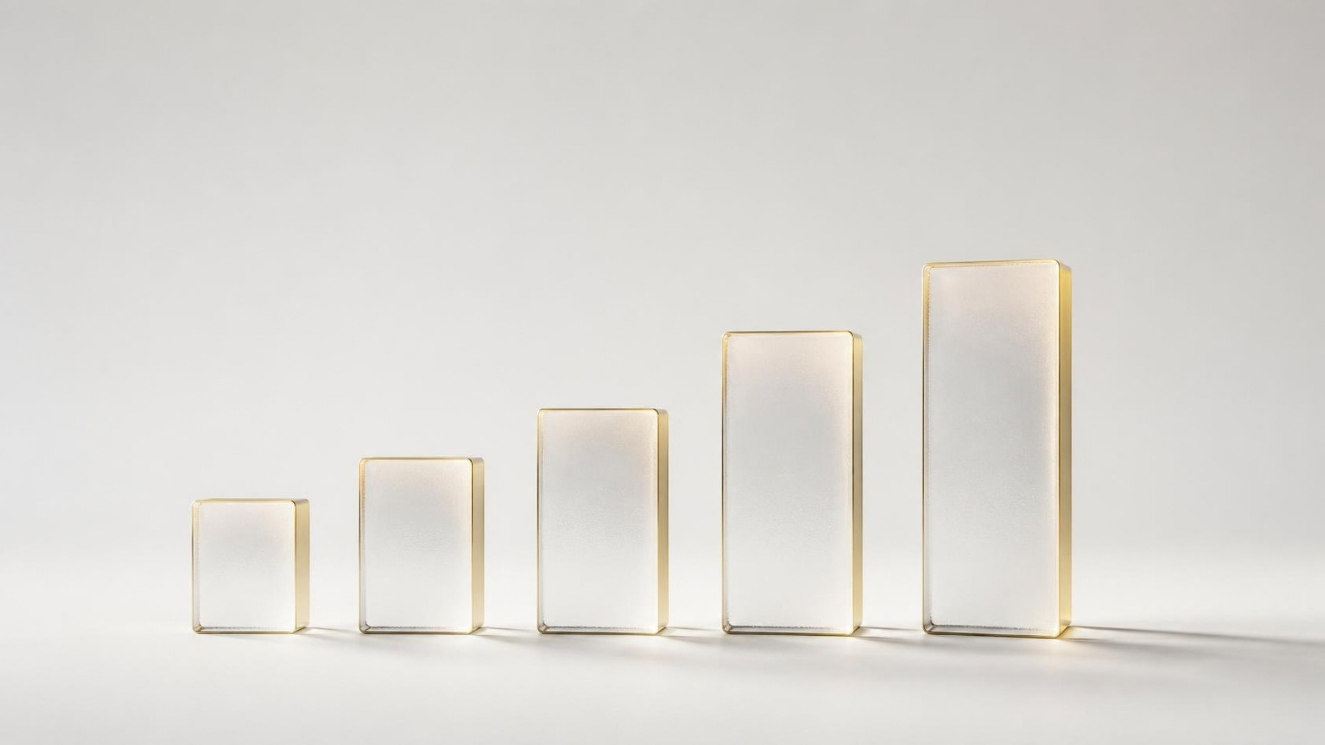 Five glass blocks of increasing height, one for each level of the program.